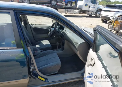 1998 Toyota Corolla Le z USA, uszkodzony, nr VIN 1NXBR18E3WZ111112